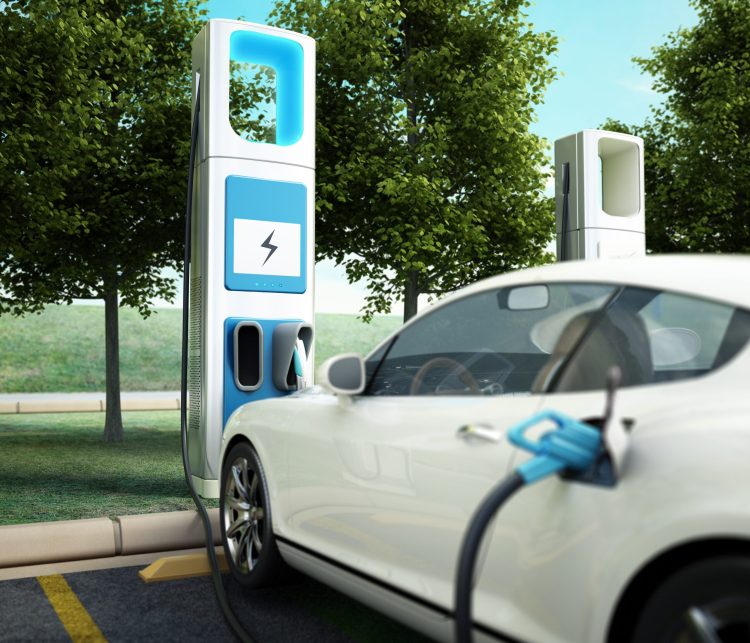 Electric,Car,Charging,Station.,Focus,On,Charging,Point,At,Car